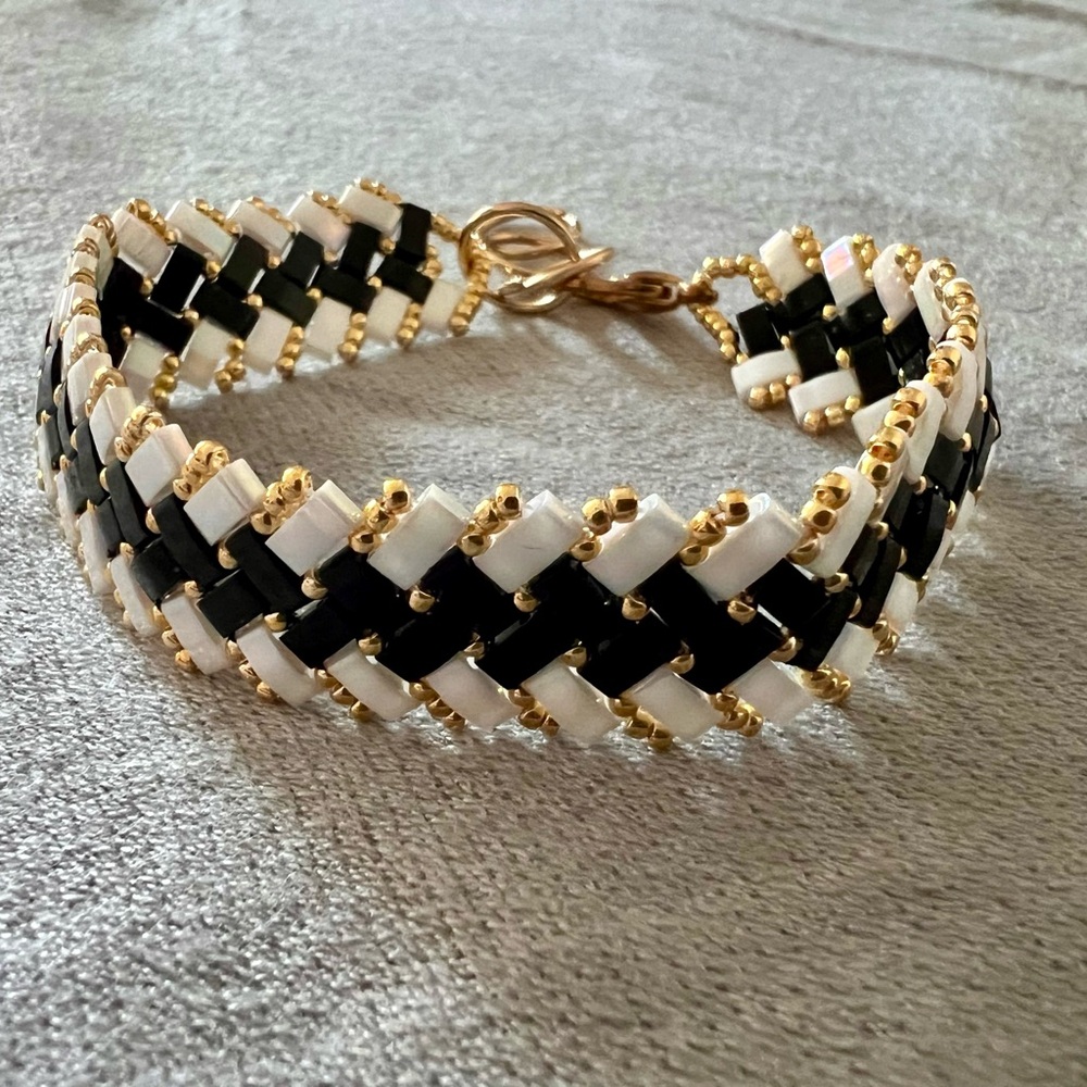 Elegant Black and Handmade White Beaded Bracelet